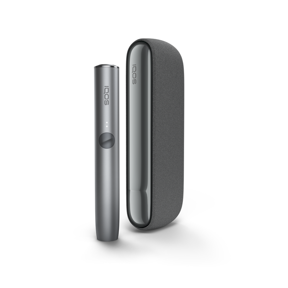 IQOS ILUMA PEBBLE GREY Mobility Kit, Pebble Grey A Pebble Grey IQOS ILUMA device and holder.
