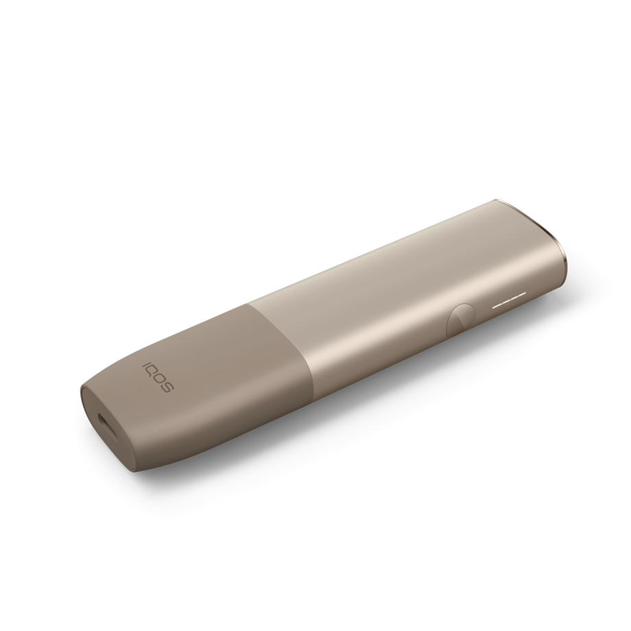 A side view of an Pebble Beige IQOS ILUMA ONE. 