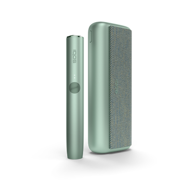 A Jade Green IQOS ILUMA PRIME device and holder. 