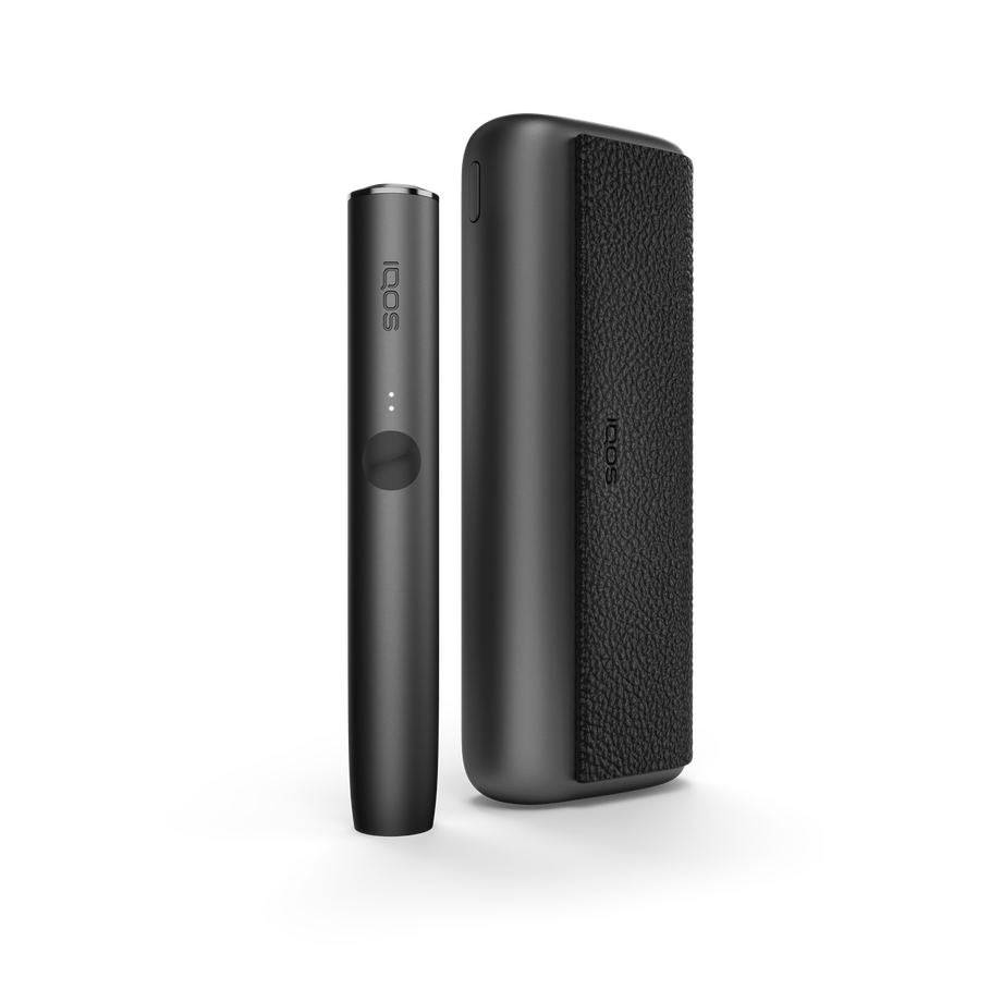 IQOS ILUMA PRIME OBSIDIAN BLACK Mobility Kit, Obsidian Black A Obsidian Black IQOS ILUMA PRIME device and holder.