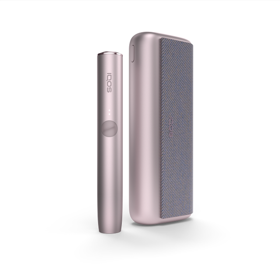 IQOS ILUMA PRIME BRONZE TAUPE Mobility Kit, Bronze Taupe A Bronze Taupe IQOS ILUMA PRIME device and holder.