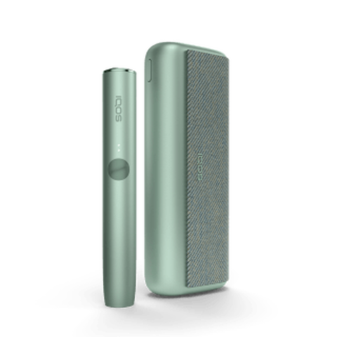 A jade green IQOS ILUMA PRIME device and holder.
