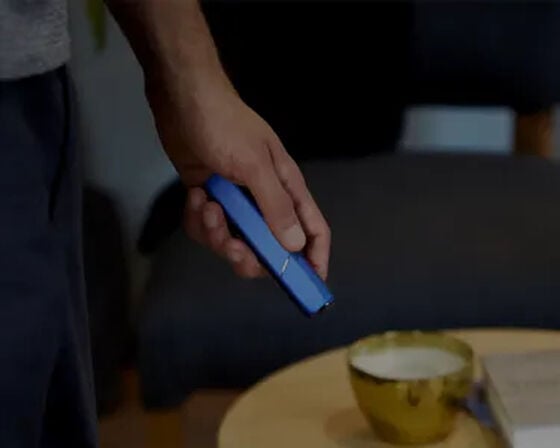 Different IQOS devices on a table