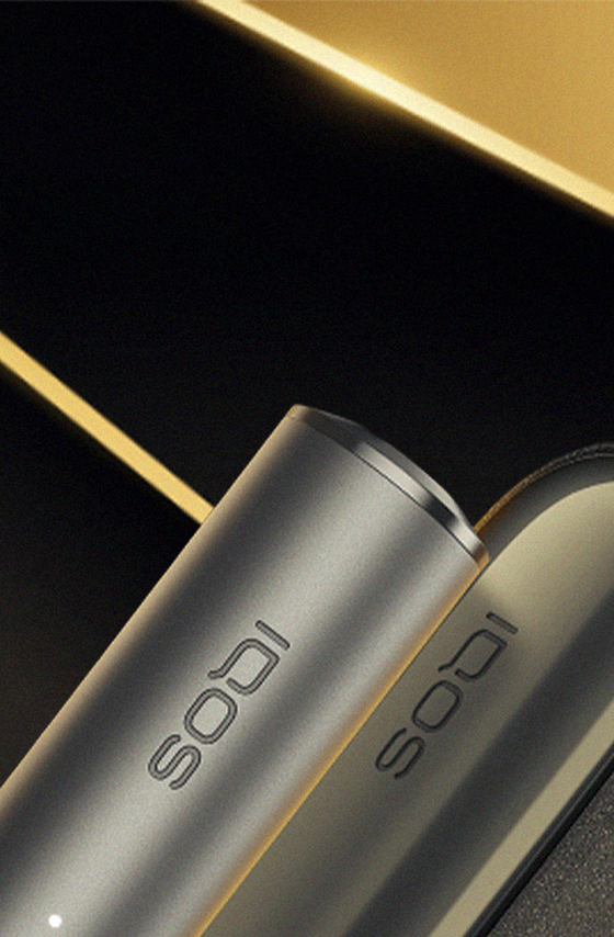 An IQOS device on a sound mixing board.