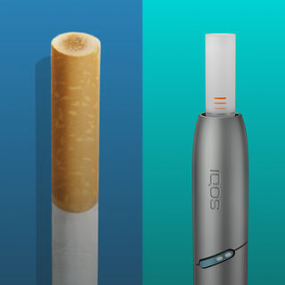 IQOS Originals Duo holder with HEETS stick, next to a cigarette.