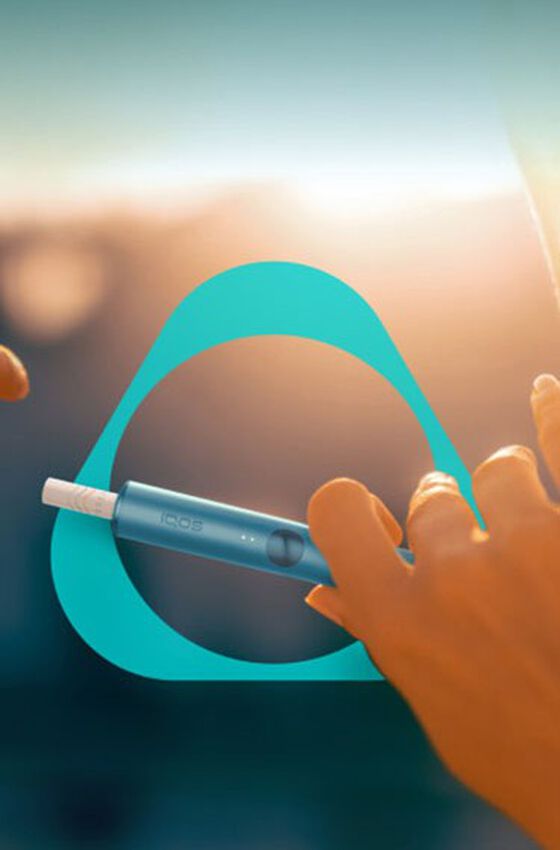 An IQOS device on a sound mixing board.