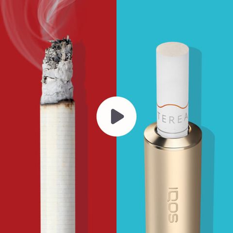 Lit cigarette end compared to IQOS HEETS stick in IQOS 3 DUO holder.
