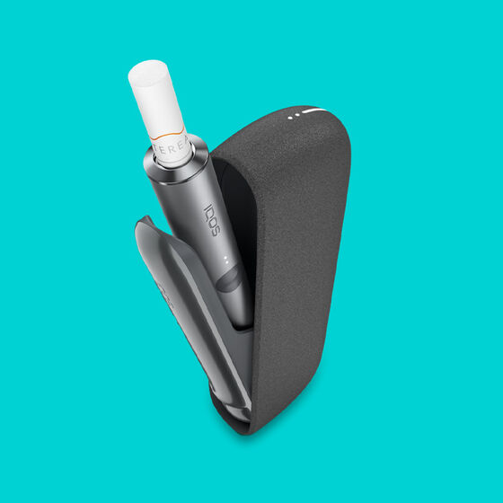 A dark IQOS ILUMA Holder inside a Pocket Charger.