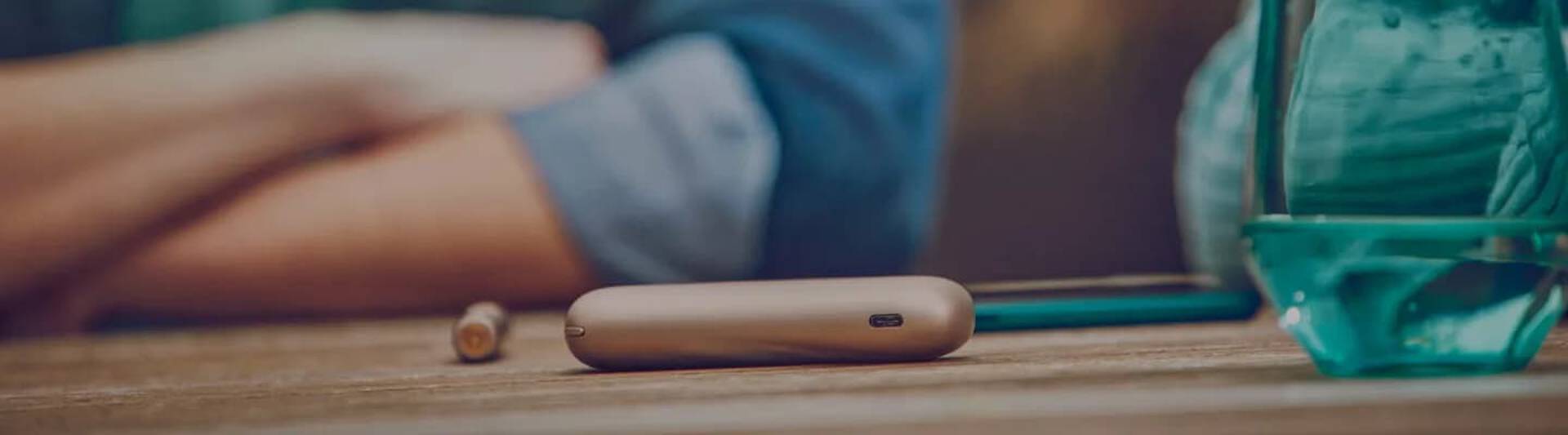 Different IQOS devices on a table