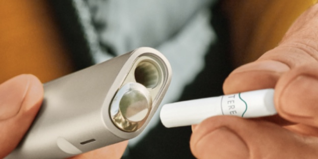 IQOS ILUMA ONE device with a TEREA stick.